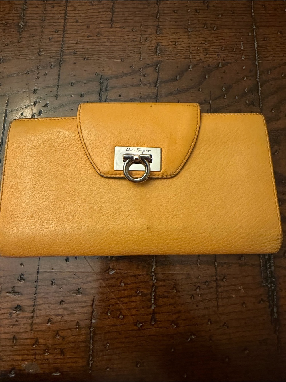 Salvatore Ferragamo Mustard Leather Flap Wallet with Signature Ring